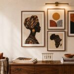How to set up a gallery wall – Afrocentric art prints in terracotta and indigo frames above a rattan console table