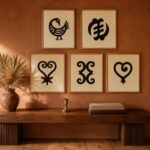 Adinkra 5-piece gallery wall — five framed Adinkra symbol prints above walnut console in warm earth tones