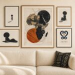Afrocentric wall art gallery — Africa map, Black woman portrait and adinkra prints above a cream sofa